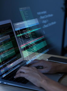 programming-background-with-person-working-with-codes-computer (1) (1).jpg